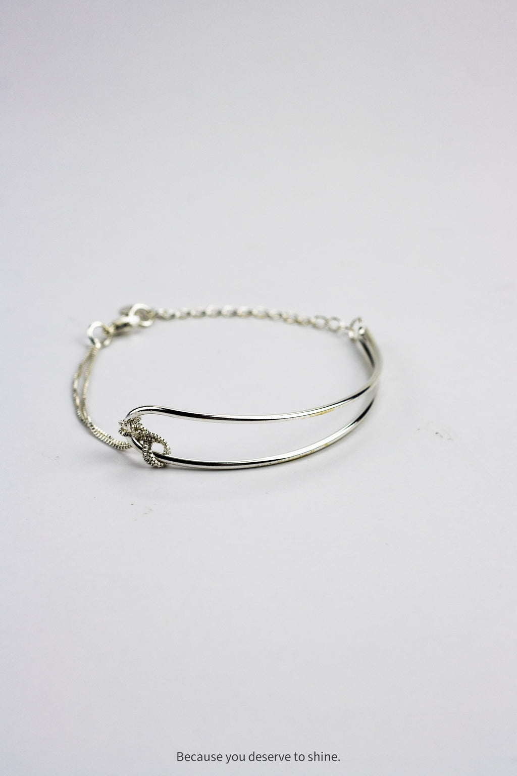 Minimalist Silver Bangle with Connection Knot Detail