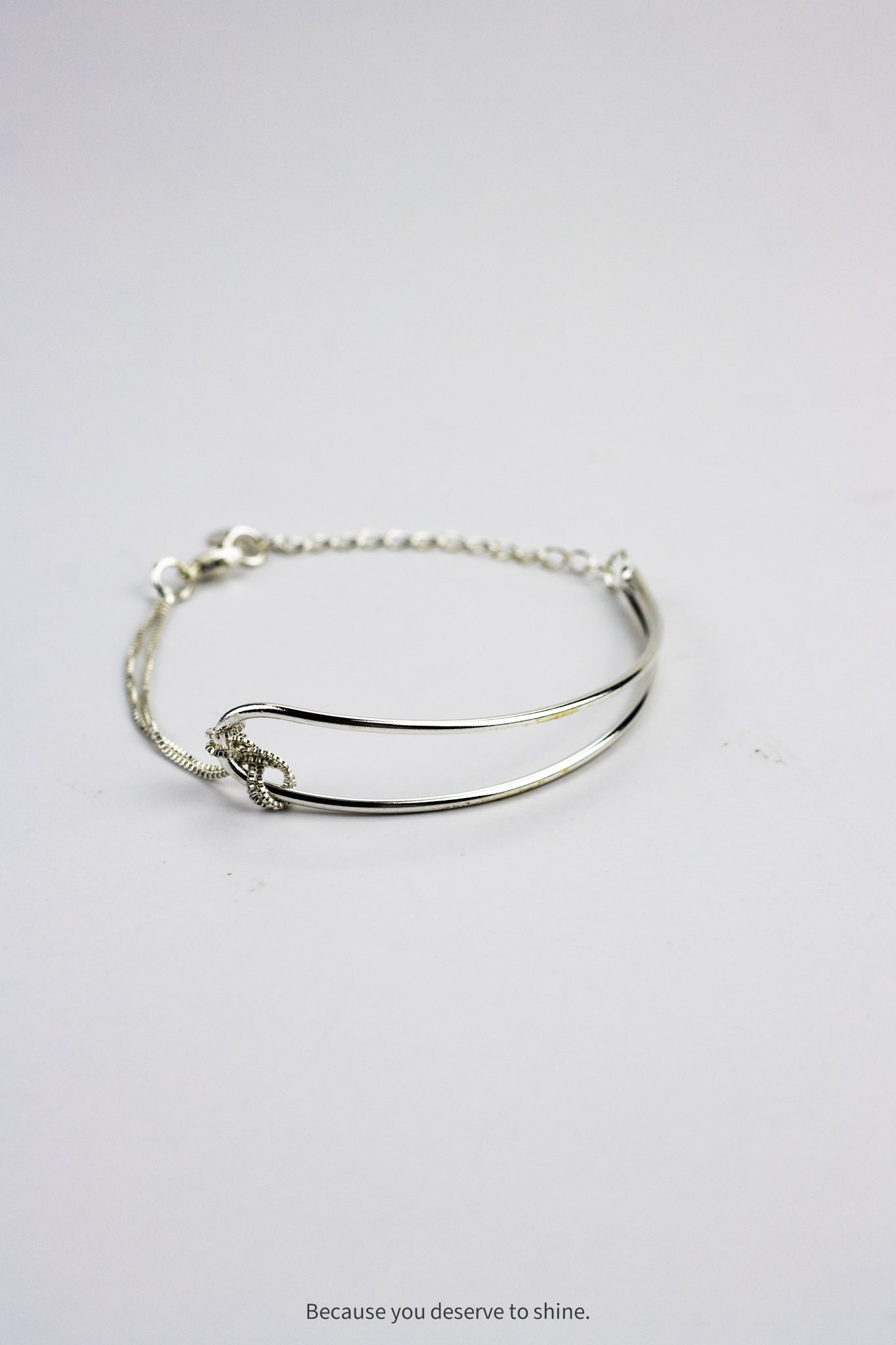 Minimalist Silver Bangle with Connection Knot Detail