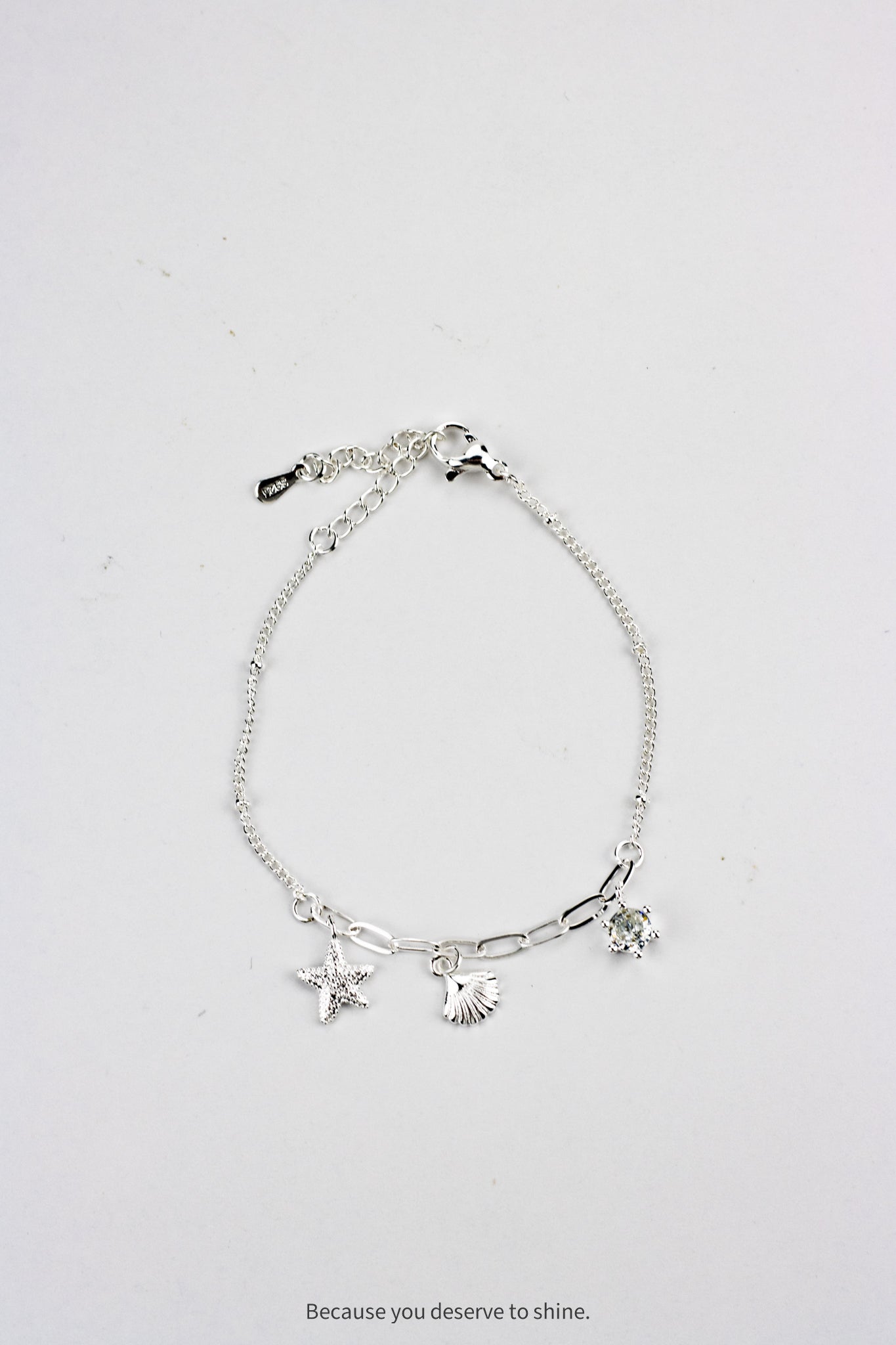 The Timeless Starfish, Shell, and Solitaire Dangle Bracelet