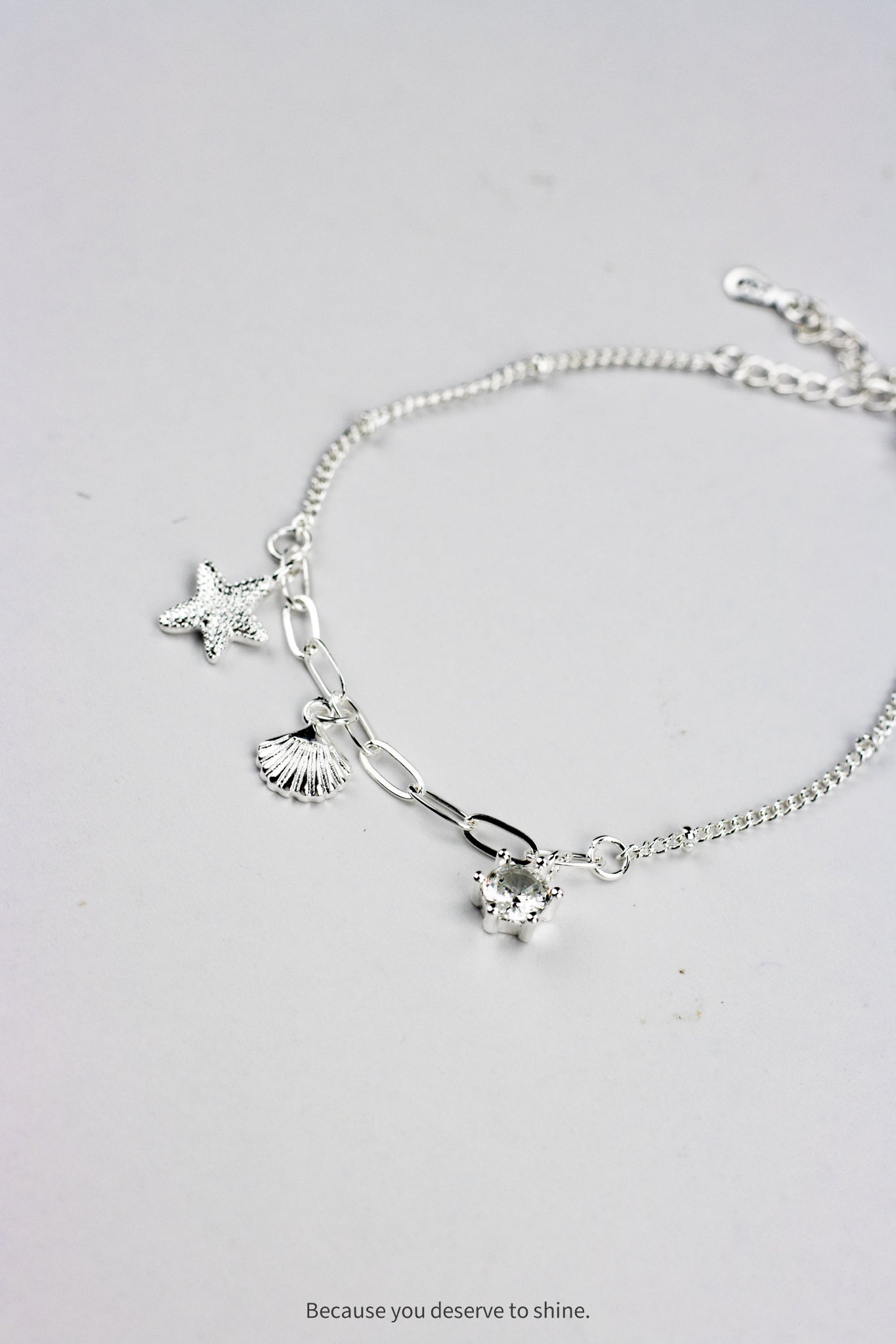 The Timeless Starfish, Shell, and Solitaire Dangle Bracelet