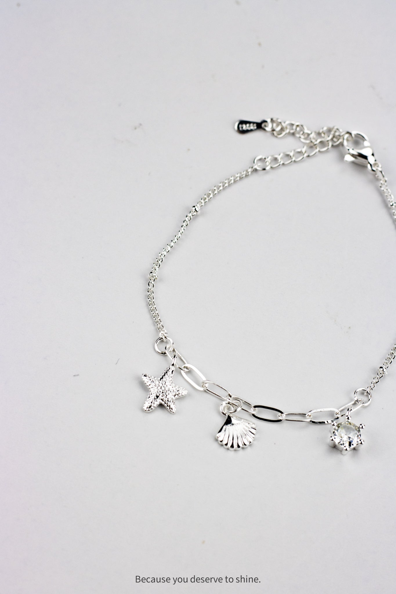 The Timeless Starfish, Shell, and Solitaire Dangle Bracelet